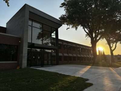 school front entrance in sunset