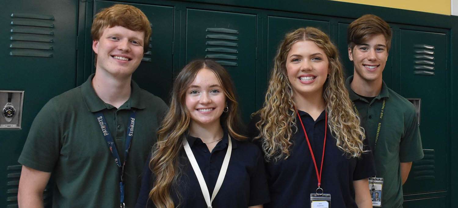 Boys and Girls in front of lockers